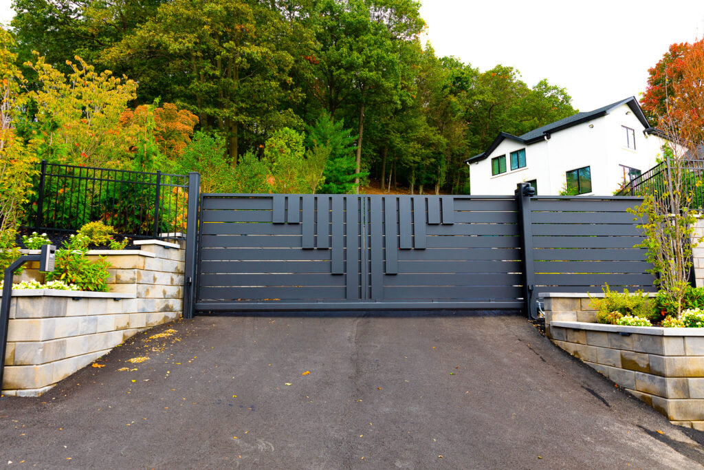 Modern dark gray horizontal slat gates